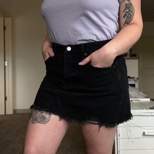 Black denim mini skirt
